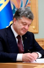 Poroshenko enacts NSDC decision on defense financing